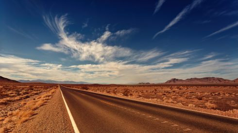 brown concrete road during daytie